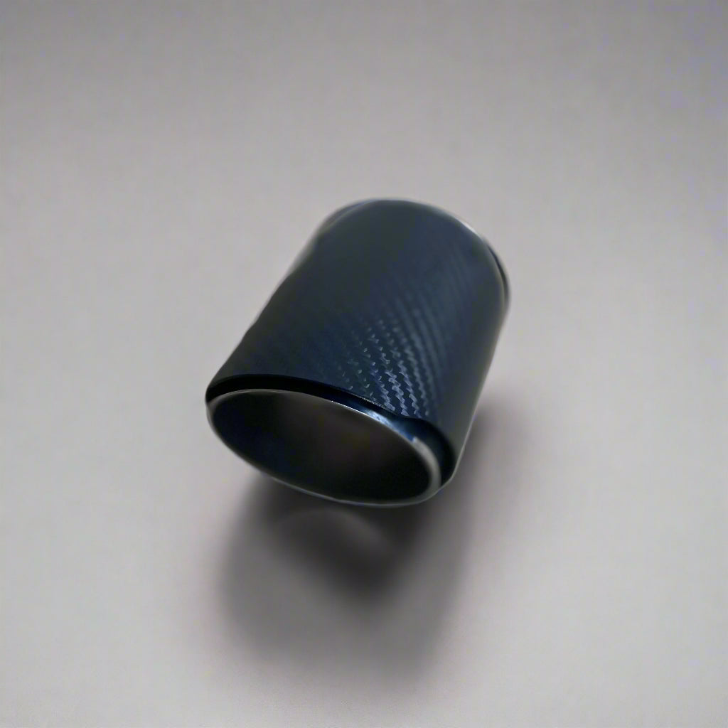 Polished stainless steel tailpipe for custom exhaust systems, featuring a sleek design for enhanced style and performance.