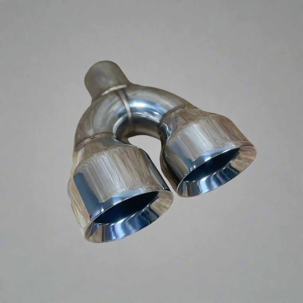 Twin Round 4 inch Slash Cut Staggered Tailpipe (RH) in stainless steel, designed for custom exhaust systems with a sleek, aggressive look.