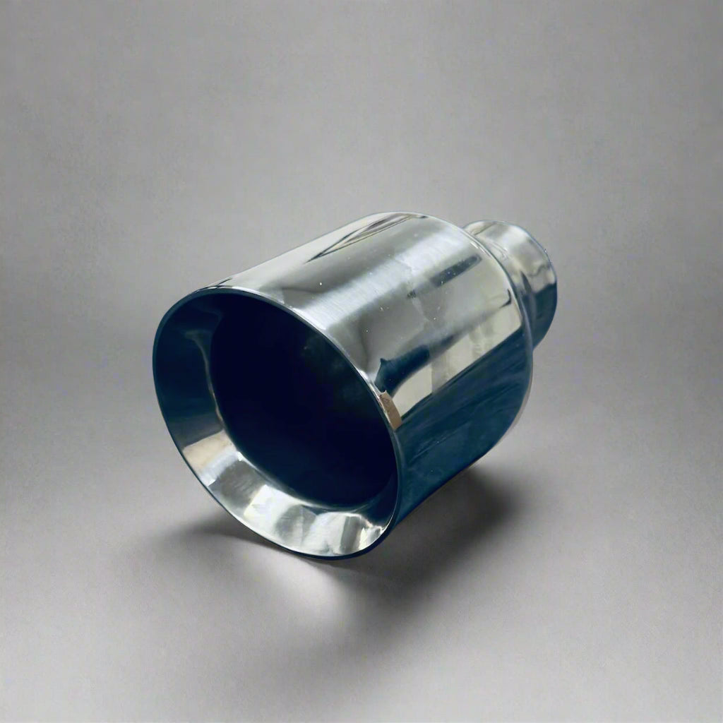 4-inch round slash-cut tailpipe with a polished finish, featuring a 2.25-inch inlet and 7-inch length for a sleek and sporty exhaust upgrade.