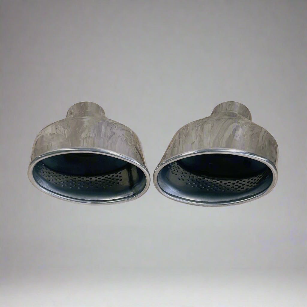 Pair of Silver RS Style Exhaust Tailpipes, featuring a sleek and sporty design, durable stainless steel construction, and a universal fit for a range of vehicles. Ideal for enhancing the performance and aesthetic of your ca