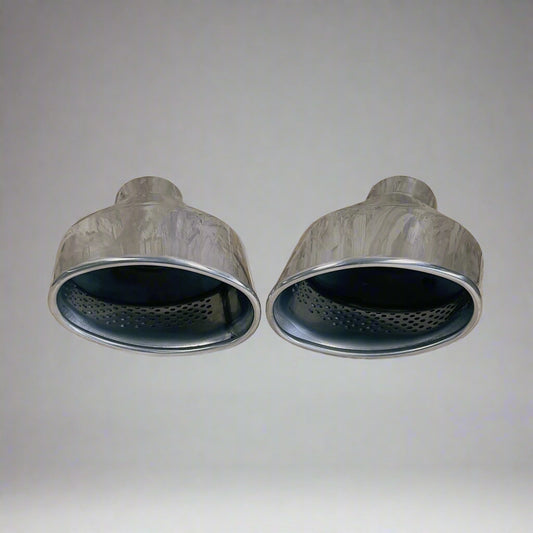 Pair of Silver RS Style Exhaust Tailpipes, featuring a sleek and sporty design, durable stainless steel construction, and a universal fit for a range of vehicles. Ideal for enhancing the performance and aesthetic of your ca